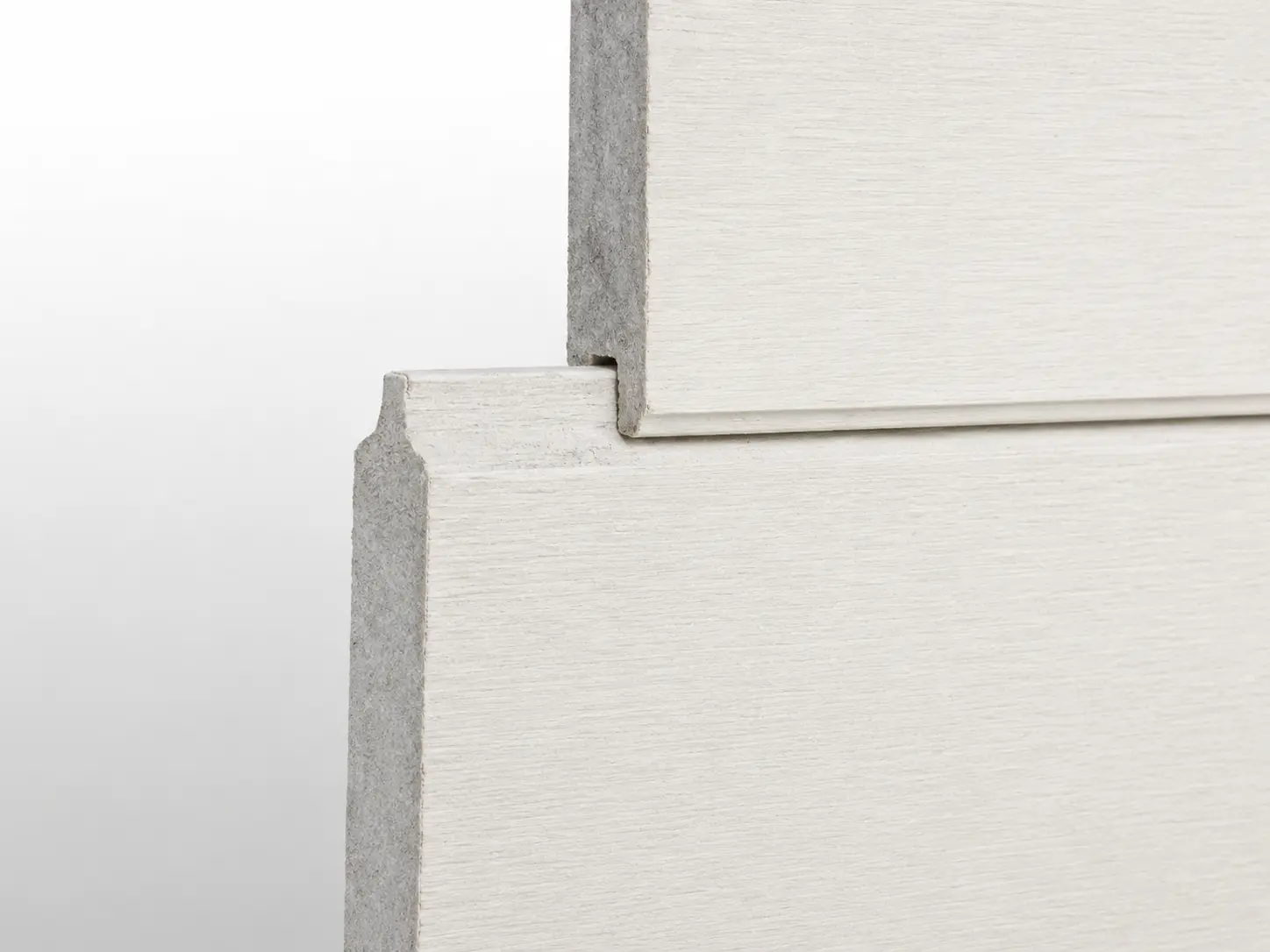 Plycem Siding Tongue-and-Groove (Machihembrado) profile close-up — fiber-cement plank with tongue-and-groove edge geometry